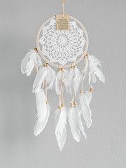 White dreamcatcher - Indian amulet that protects the sleeper from evil spirits and diseases. Card with instructions.