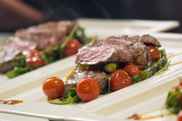 Freshly grilled steak middle raw with vegetables