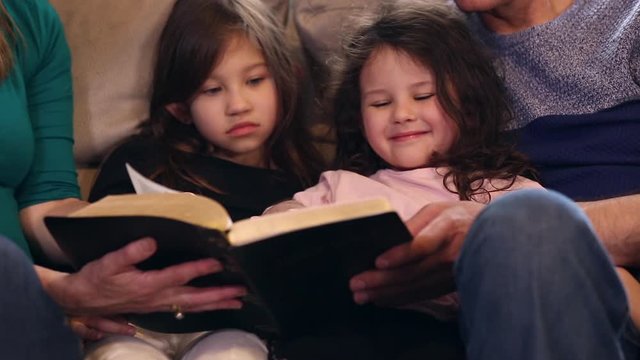Family Reading the Bible together
