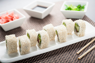 Uramaki sushi light maki on a dish