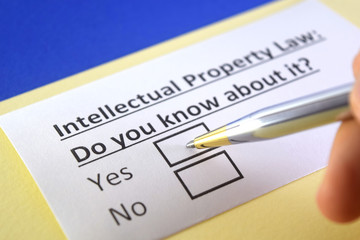 Obraz premium One person is answering question about intellectual property law.