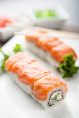 Uramaki sushi gurme maki on a dish