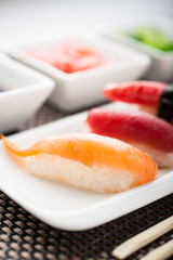 Unagi sushi in front of a nigiri plate