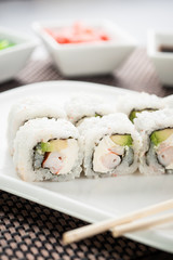 Sushi maki and uramaki rolls with philadelphia