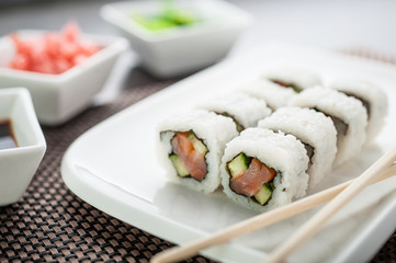 Uramaki sushi kunsai maki on a white plate
