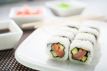 Uramaki sushi kunsai maki on a white plate