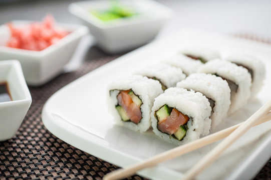 Uramaki sushi kunsai maki on a white plate