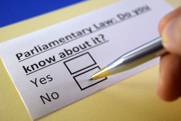 Fototapeta premium One person is answering question about parliamentary law.
