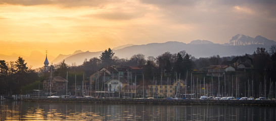 Lake of geneva landscape with home town on sunrise in Switzerland