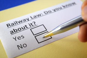 One person is answering question about railway law.