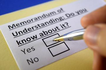 One person is answering question about memorandum of understanding.