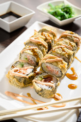 SAKE AVOKADO TEMPURA hot sushi rolls with salmon