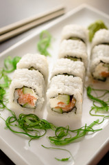 SAKURA CHEESE MAKI sushi rolls with salmon