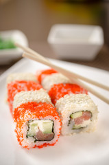 Sushi maki rolls with salmon, cucumber