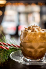 Hot chocolate with a red and white candy cane