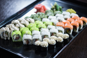 Sushi set with various maki and uramaki sushi type