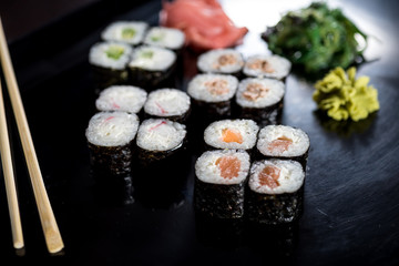 Sushi set with 16 pieces and various maki