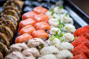 Sushi set with various maki and uramaki sushi type