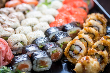 Sushi set with various maki and uramaki sushi type