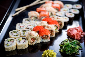 Sushi set with various maki and uramaki sushi type