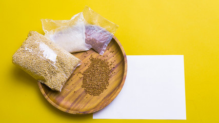 assortment of cereals and a wooden plate. Slow carbs with space to copy, banner. Russian cuisine. food delivery in self-isolation. staying at home, we take care of your health. prevention