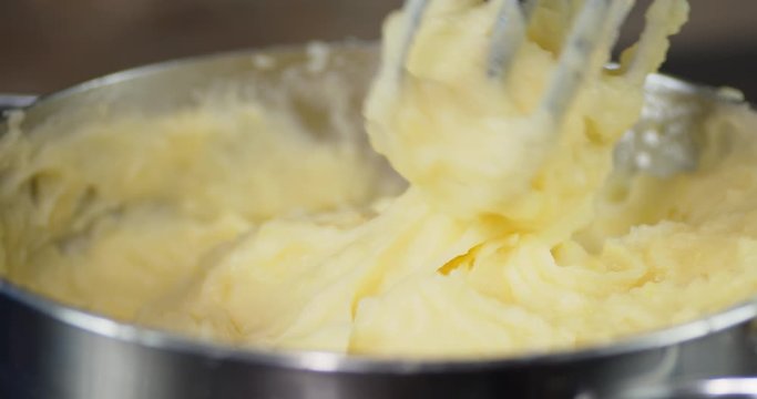 Mashed potatoes mixed with a mixer.