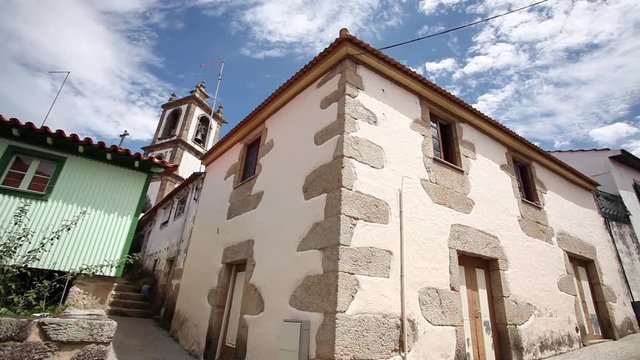 Wide shot of Tradicional Ucanha house facade in Portugal