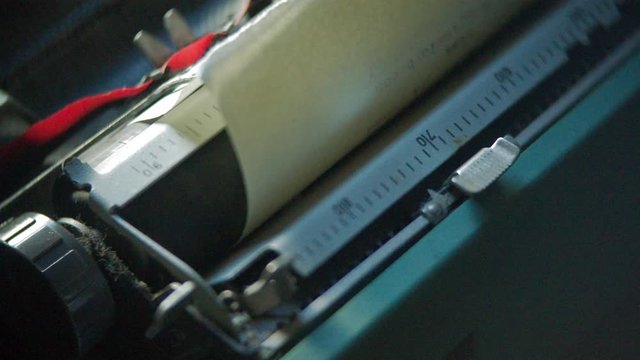 Camera pan on typewriter paper support with margin measurement