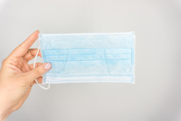 One medical masks virus protection on white background. Breathing medical facial respiratory mask....