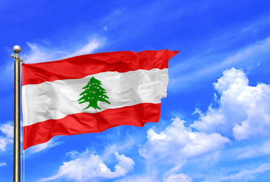 Lebanon National Flag Waving In The Wind On A Beautiful Summer Blue Sky
