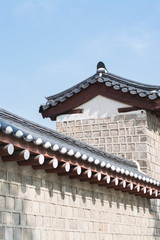 Brick wall of the Grand Palace with blue sky background, Seoul North Korea