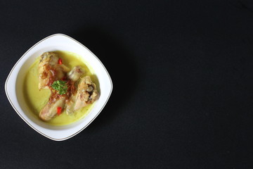 chicken typical opor indonesia isolated on background