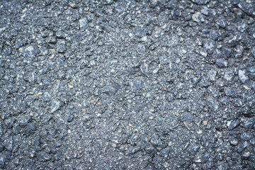 Texture of concrete road made of rock and sand