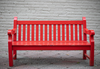 red bench in the park - Powered by Adobe