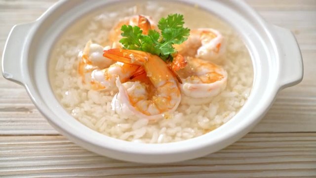 porridge or boiled rice soup with shrimps bowl