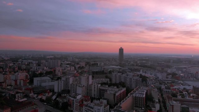 Backwards Sunset Aerial view social housing buildings Stade de France in background, Paris suburbs, Saint-Ouen France