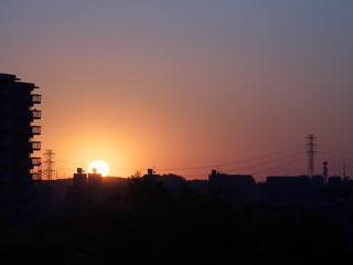 Naklejka premium Tokyo,Japan-May 14, 2020: Sunrise at the suburb of Tokyo 