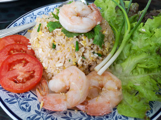 Big Shrimp Fried Rice With fresh vegetable spring onion, coriander, tomatoes as side dishes.