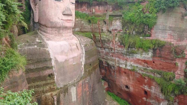 The Giant Leshan Buddha, a 71m tall stone statue built at the confluence of Minjiang, Dadu and Qingyi rivers, Sichuan, China