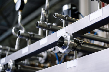 Distribution system of ball valves and metal pipelines and manometers. Equipment for the food industry.