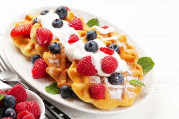 Delicious belgian waffles with summer berries