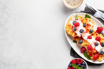 Delicious belgian waffles with summer berries