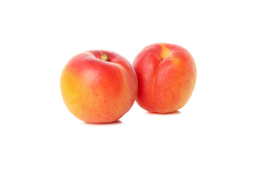 Fresh tasty apricots isolated on white background