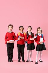 Obraz premium Cute little pupils on color background