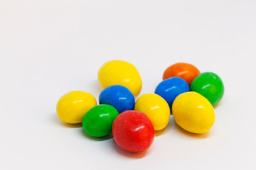 candy eggs in different colors before Easter