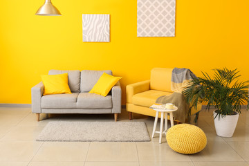 Interior of modern room with comfortable sofa