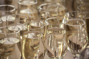 Table with glass champagne glasses