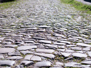 Stone paving road on a sunny day