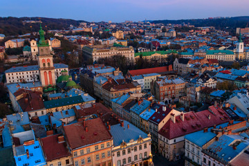 Fototapeta na wymiar Aerial view of Assumption church and historic center of Lviv, Ukraine. Lvov cityscape. View from Lviv Town Hall