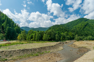 Fototapeta na wymiar Relaxation place at the foot of the Piatra Craiului massif, Plaiul foii, Zarnesti, Brasov, Romania